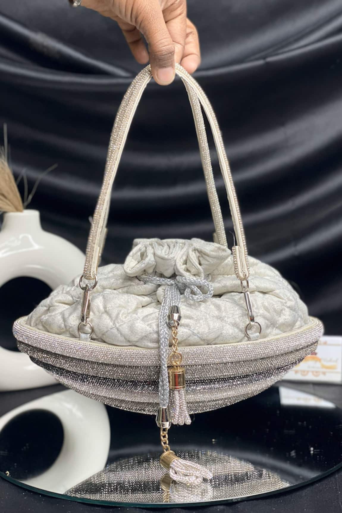 Kainiche by Mehak Shimmery Quilted Silver Potli Bag 