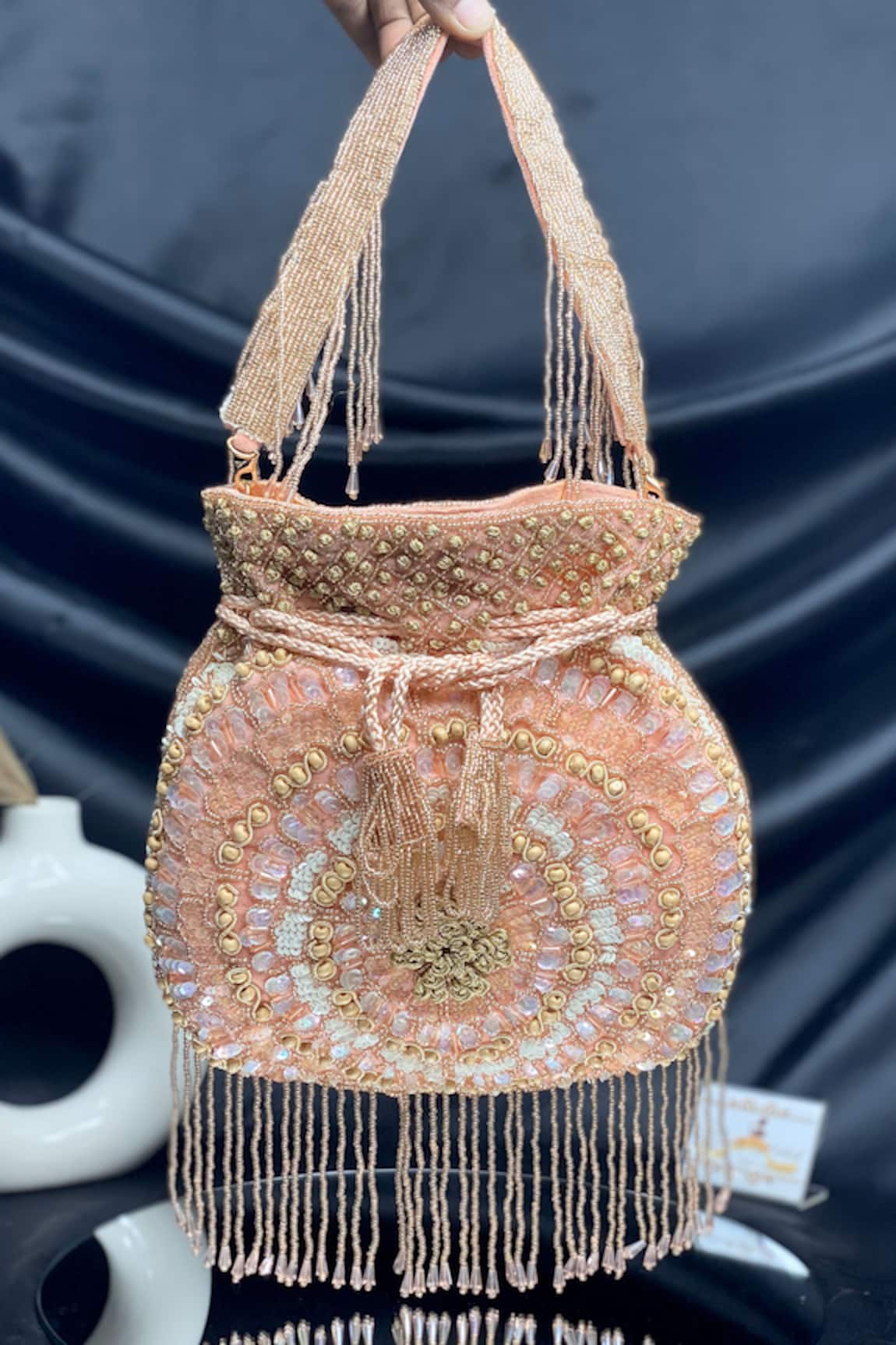 Kainiche by Mehak Rose Gold Cutdana Embellished Potli 