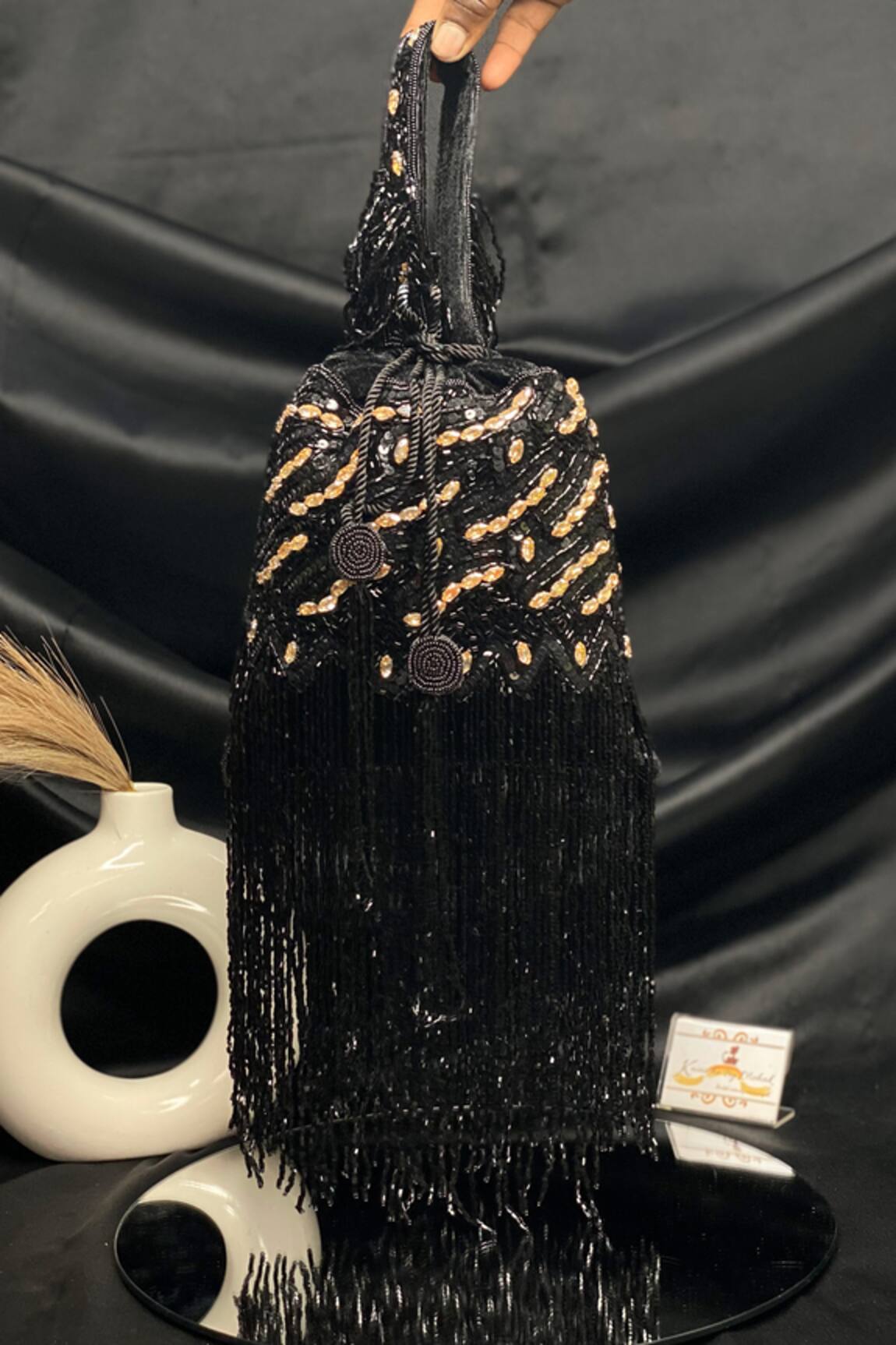 Kainiche by Mehak Black Sequin Fringed Potli Bag 