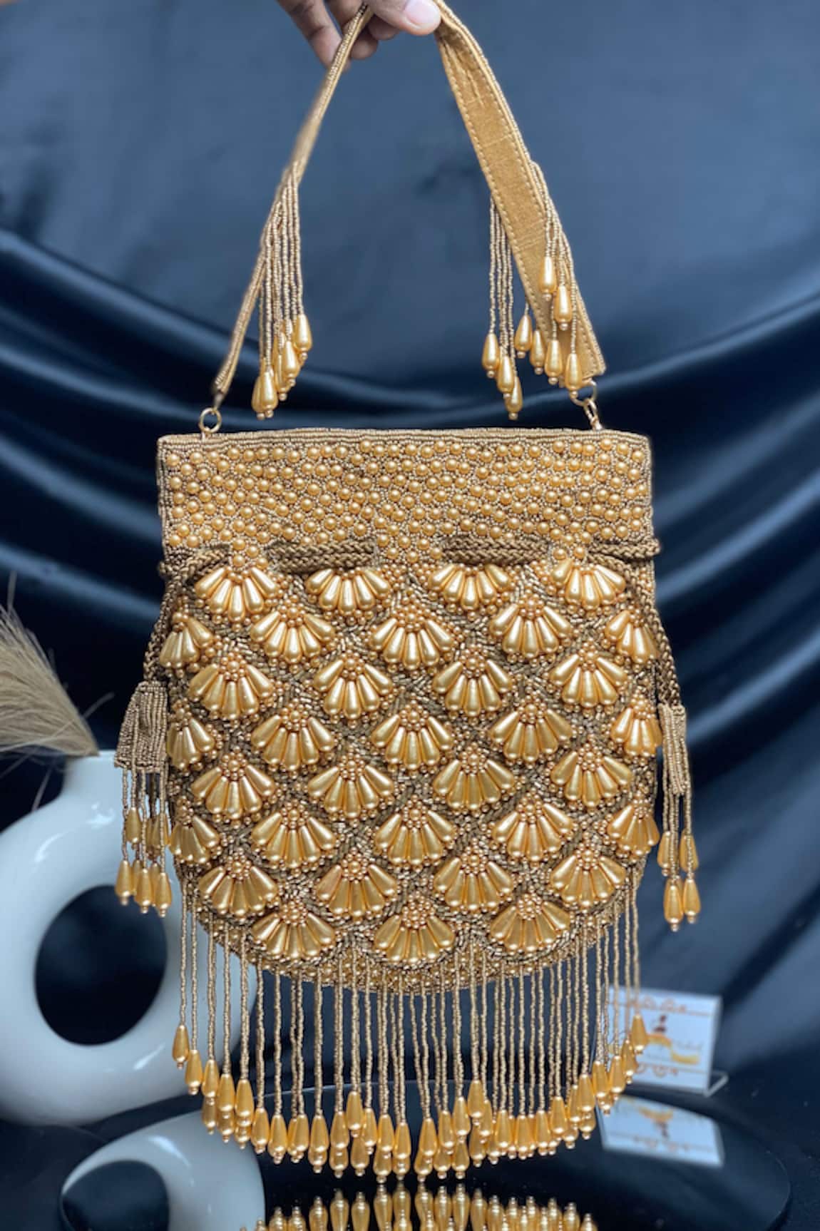 Kainiche by Mehak Copper Pearl Embroidered Potli Bag 