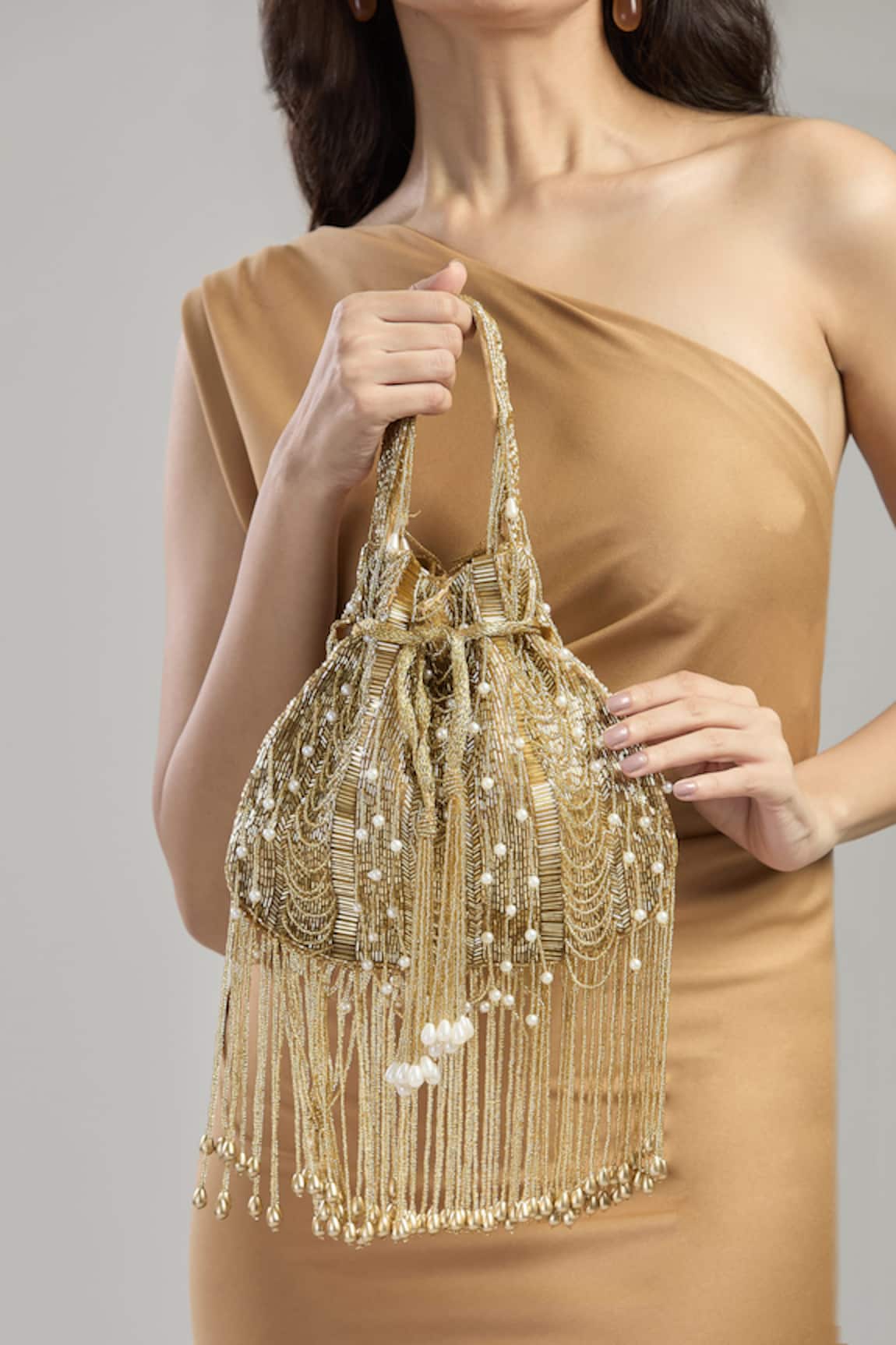 Tasna Tassel Pearl Embellished Potli Bag 