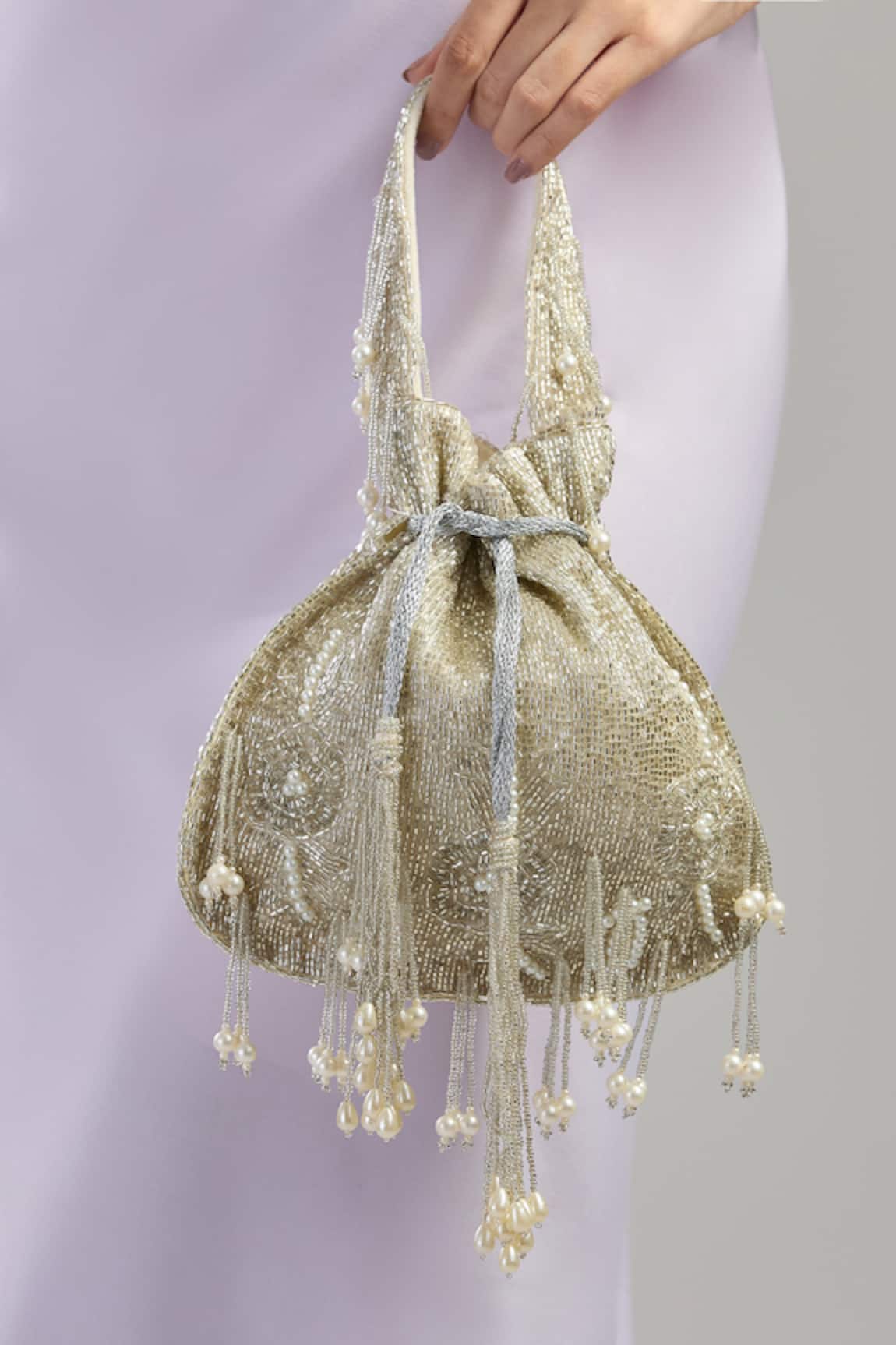 Tasna Cutdana & Pearl Tassel Potli 