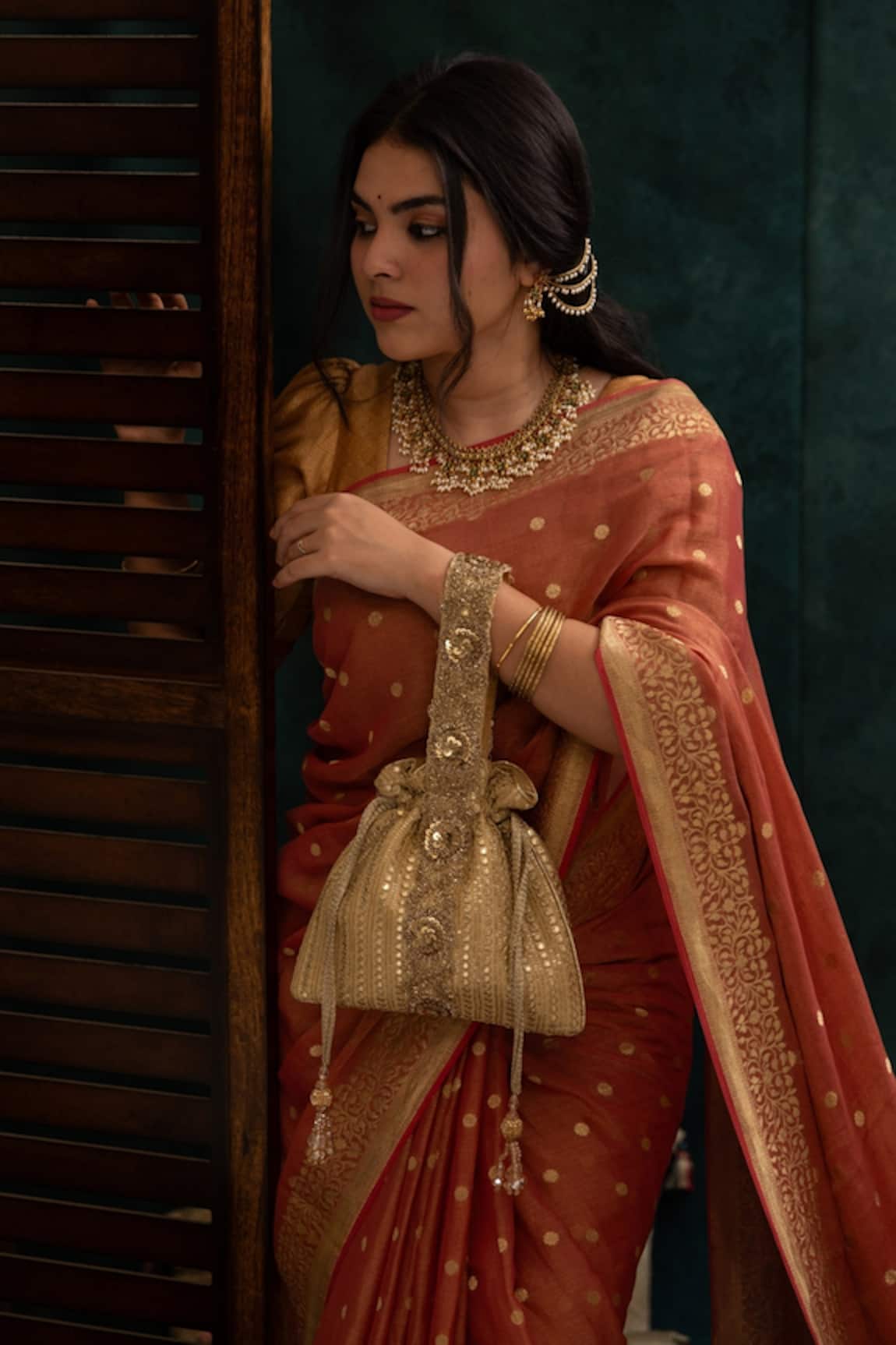 Amyra Gold Sequin Embroidered Potli Bag 