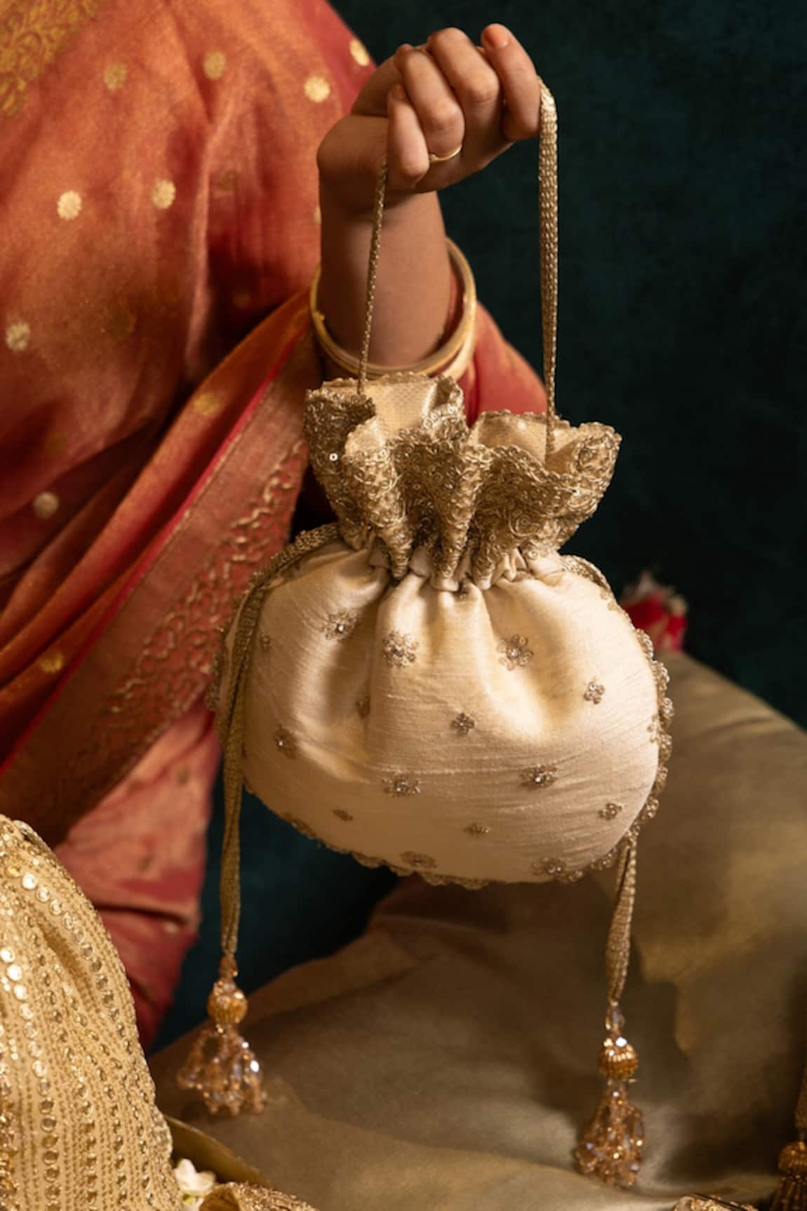 AMYRA Beige Crystal Tassel Potli Bag 