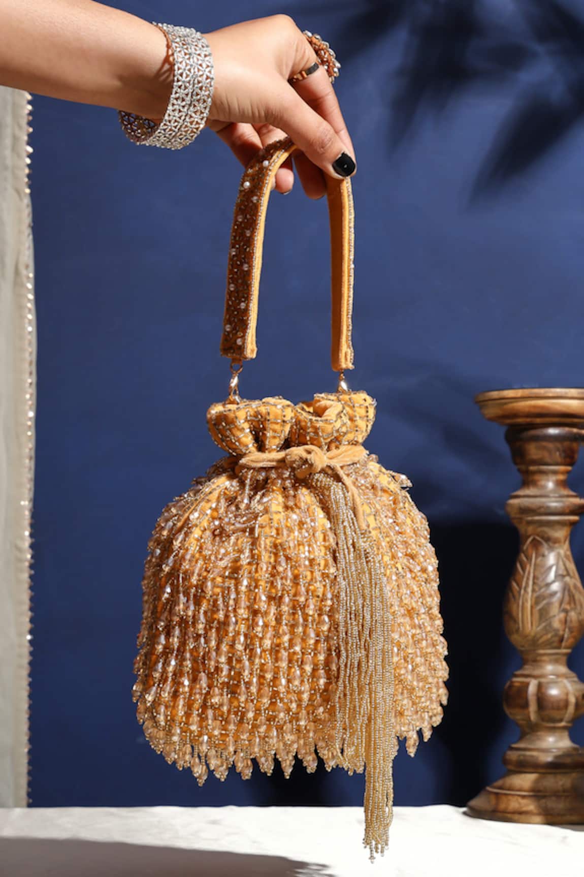 Nazaakat By Samara Singh Golden Hand Embroidered Potli Bag