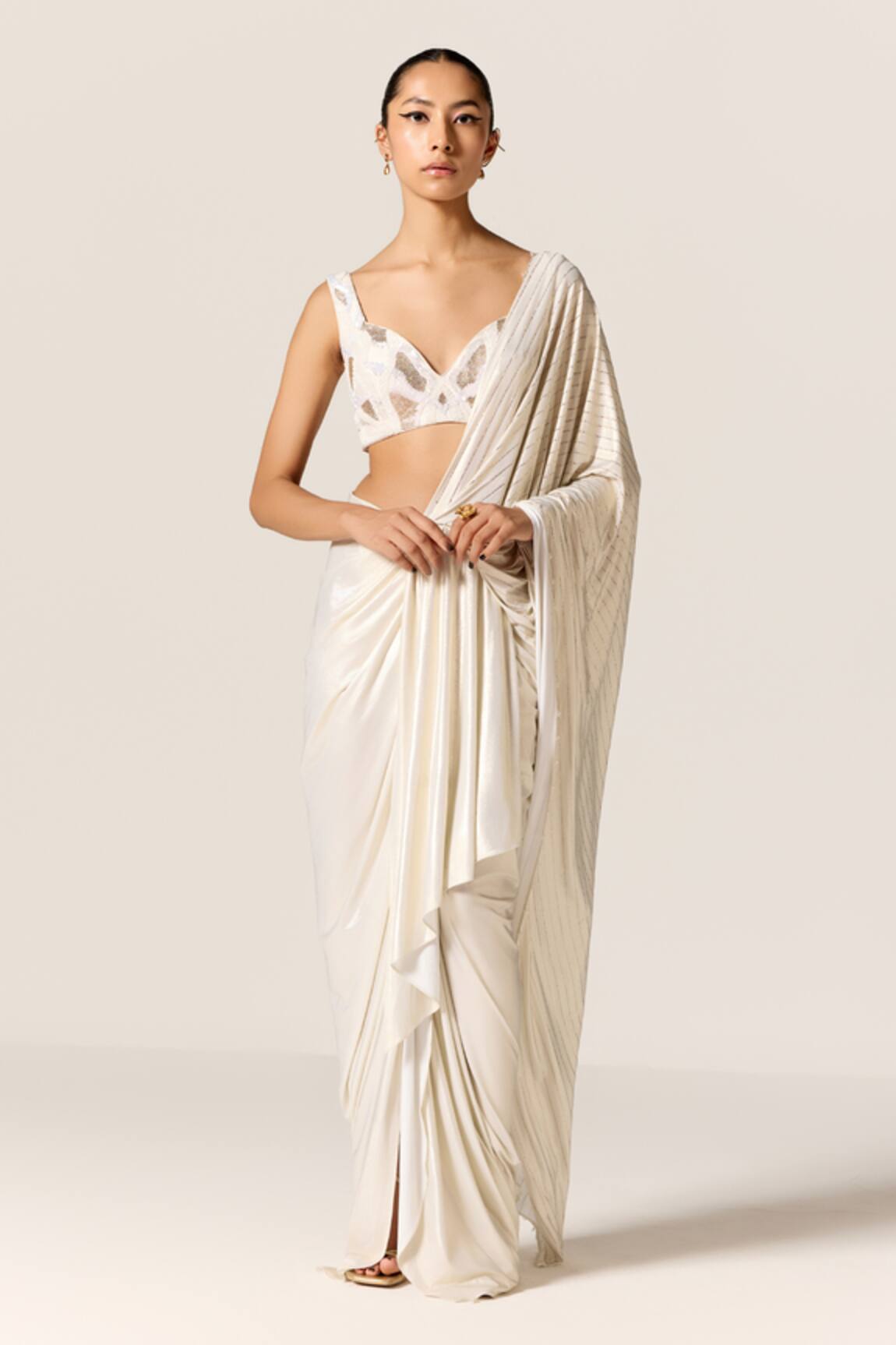 Manika Nanda Ivory Metallic Lycra Slit Saree 
