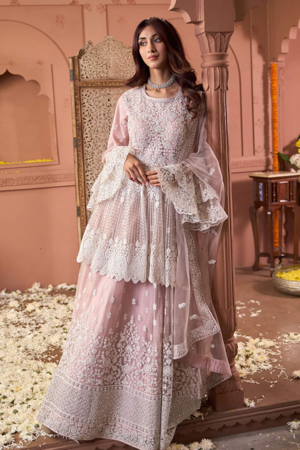 Tasuvure Indes Soft Pink Embroidered Peplum Tunic & Lehenga 