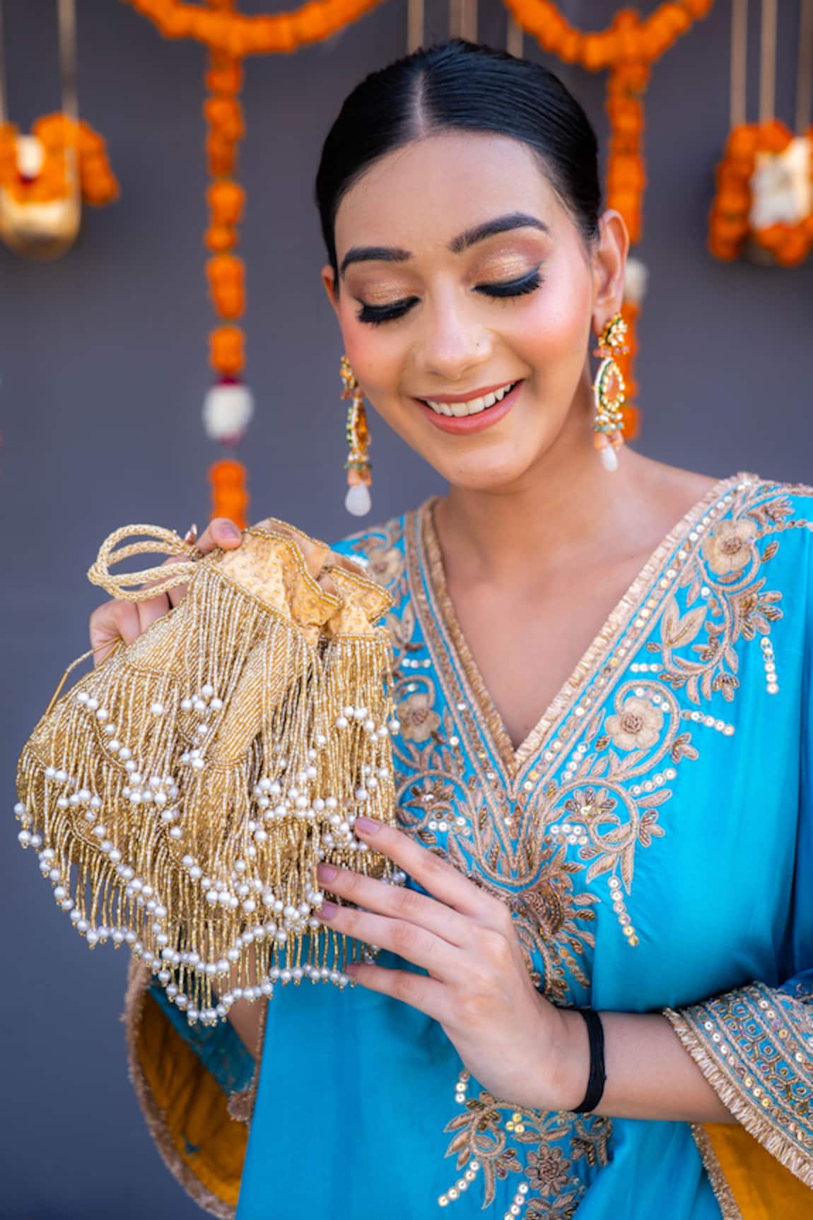A Clutch Story Gold Fringe Glam Handembroidered Potli 