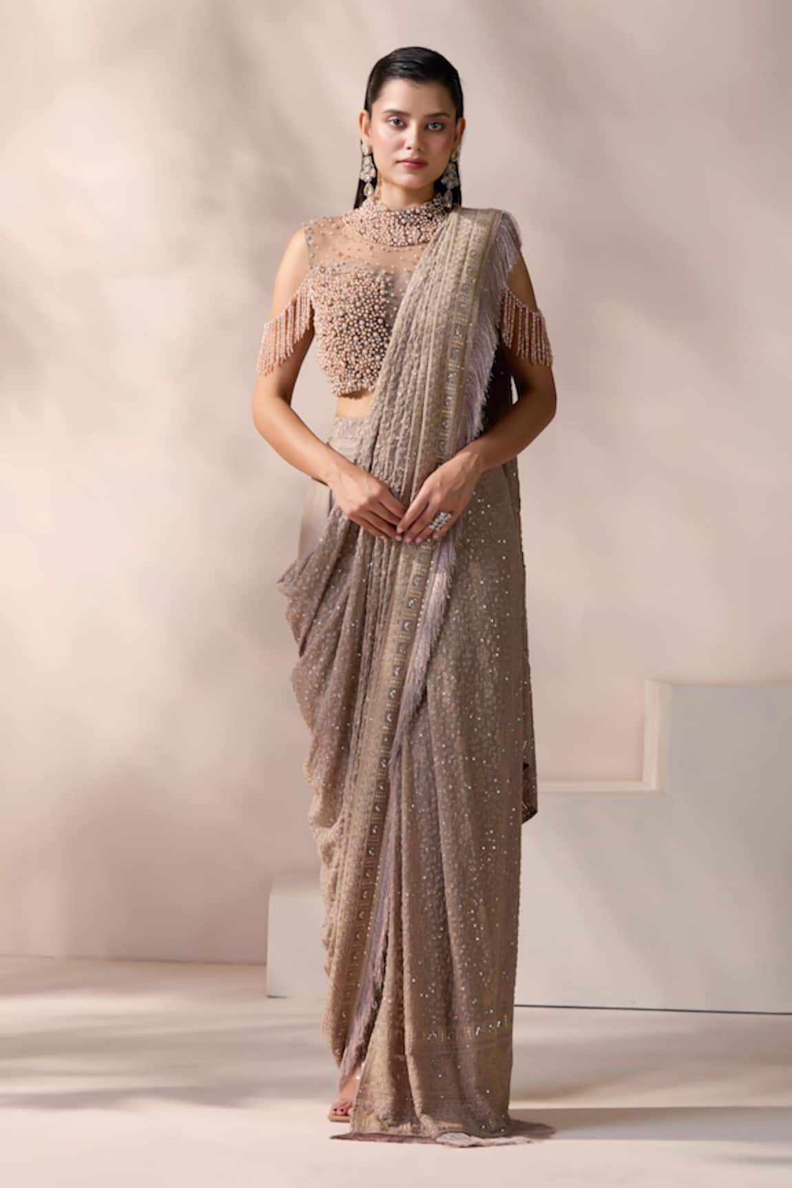 Chaashni by Maansi and Ketan Champagne Embellished Pre-Draped Saree Set 