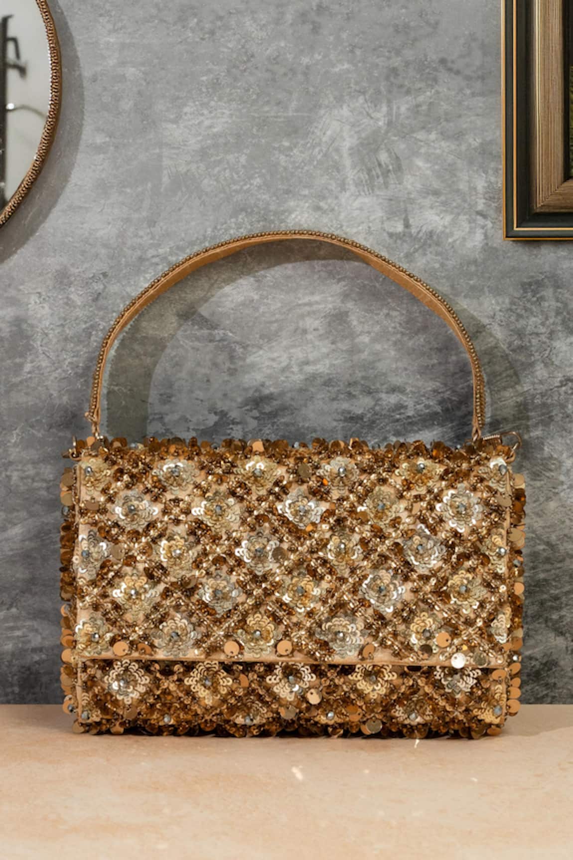 The Purple Sack Golden Tassel Clutch 