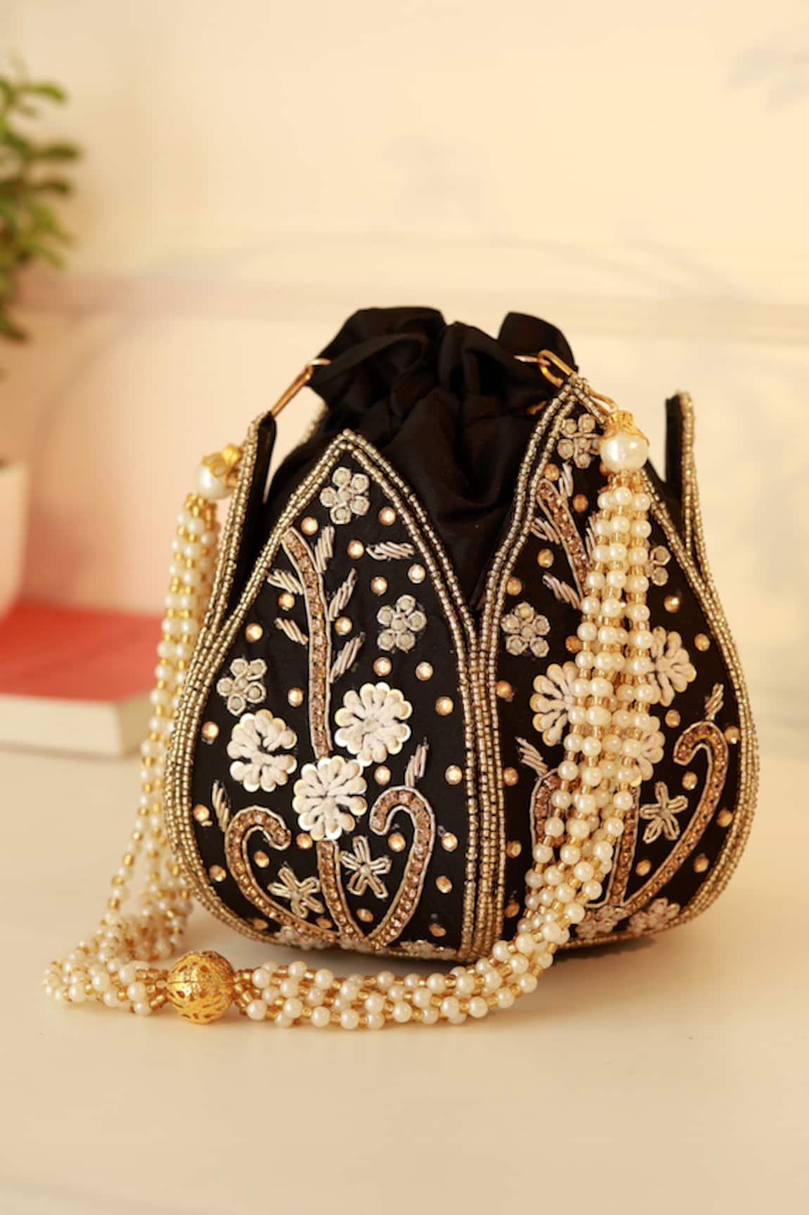 The Tan Clan Baag Black Lotus Potli 
