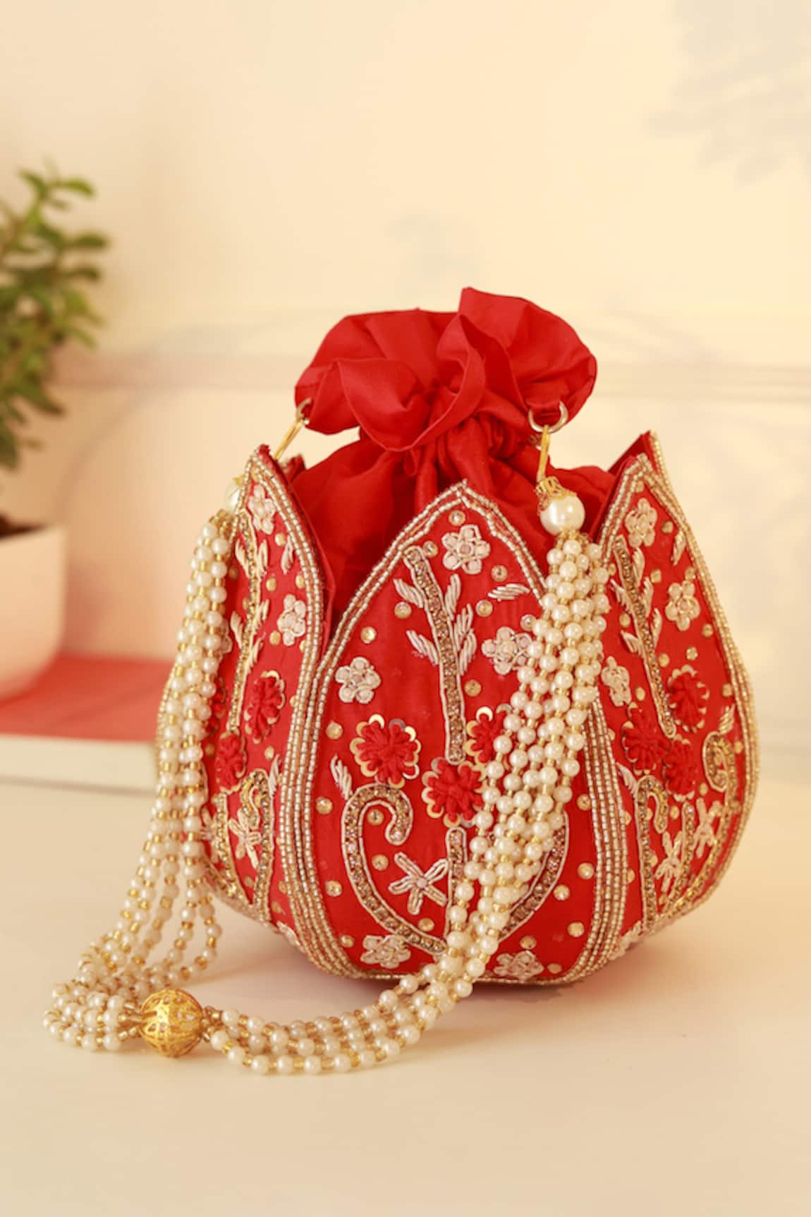 The Tan Clan Baag Red Lotus Potli 