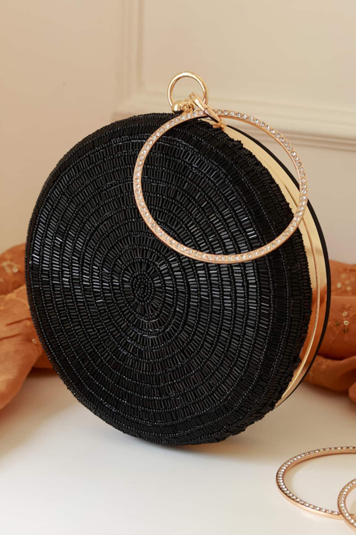 The Tan Clan Glitz Round Clutch 