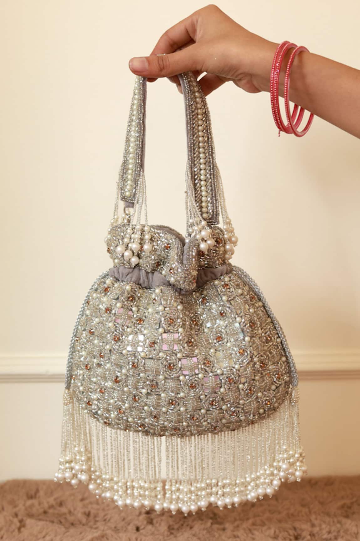 The Tan Clan Sehaj Tasselled Potli Bag 