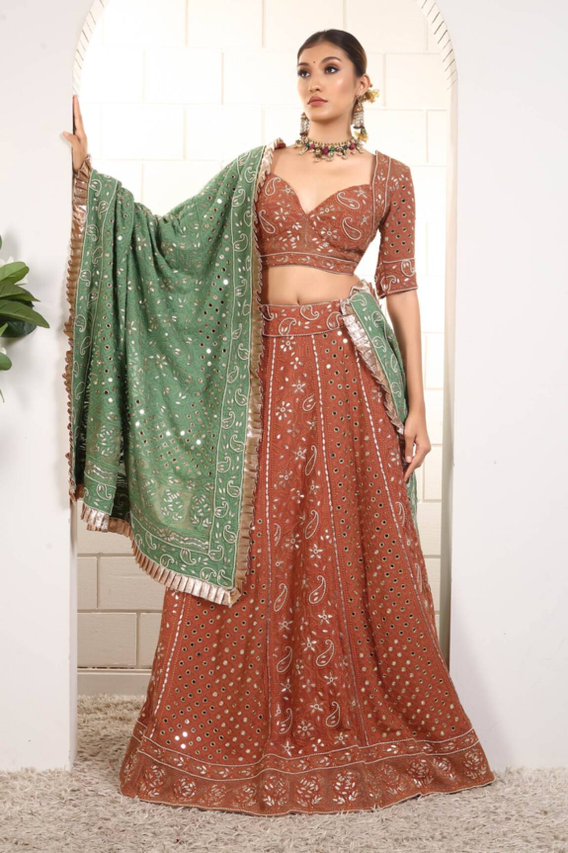 Anita Kanwal Rust Orange Embroidered Lehenga Set 