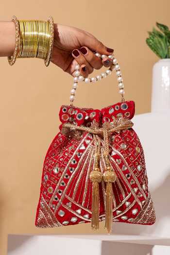 Nazaakat By Samara Singh Enchanting Golden Half-moon Potli Bag 