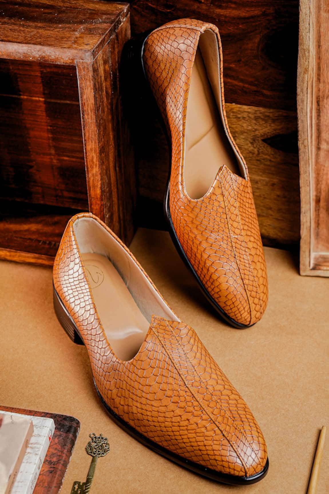 NR By Nidhi Rathi Brown Textured Patent Mojaris 