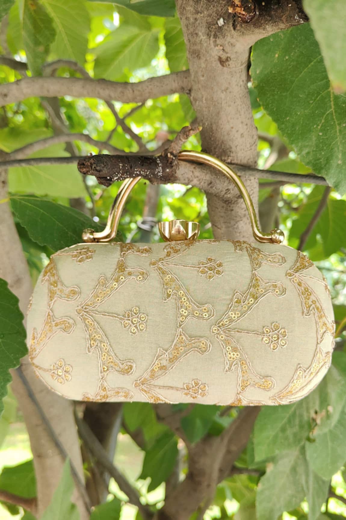 A Clutch Story Sunehri Gold Capsule Clutch 