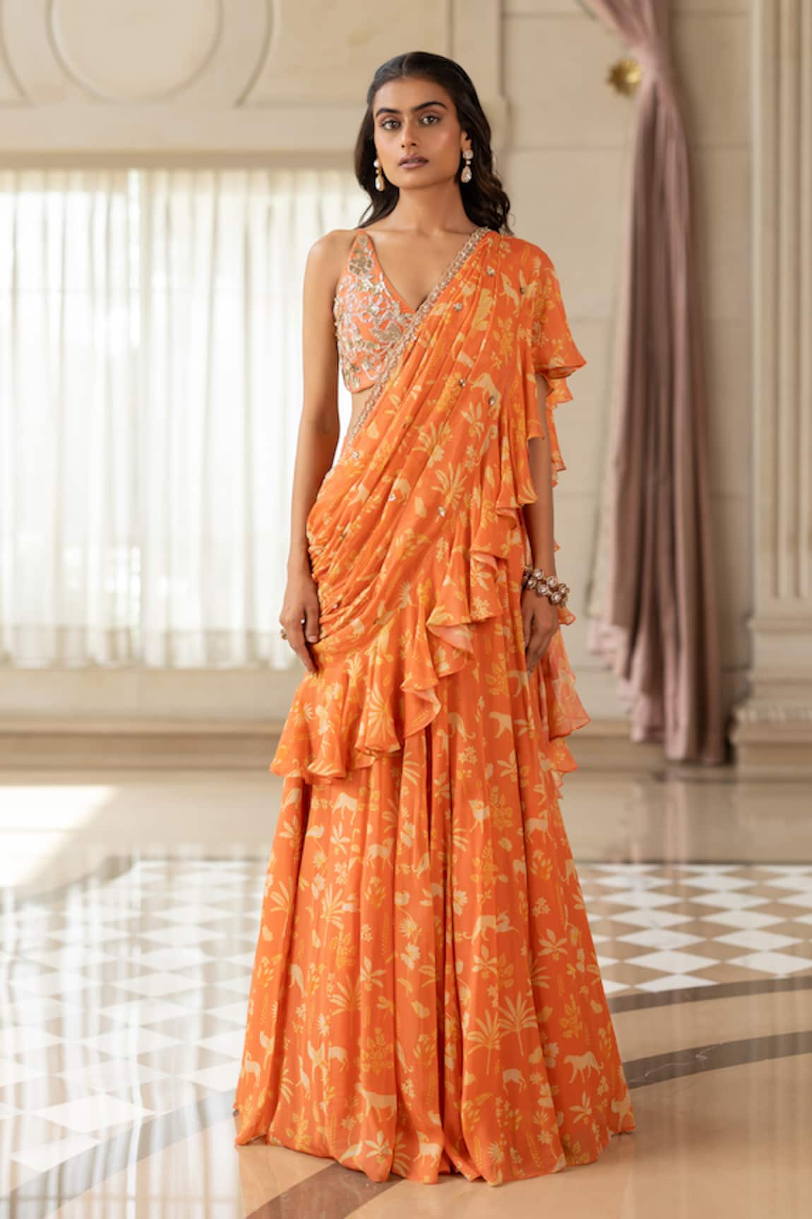 Paulmi And Harsh Orange Georgette Pre-draped Saree Set 