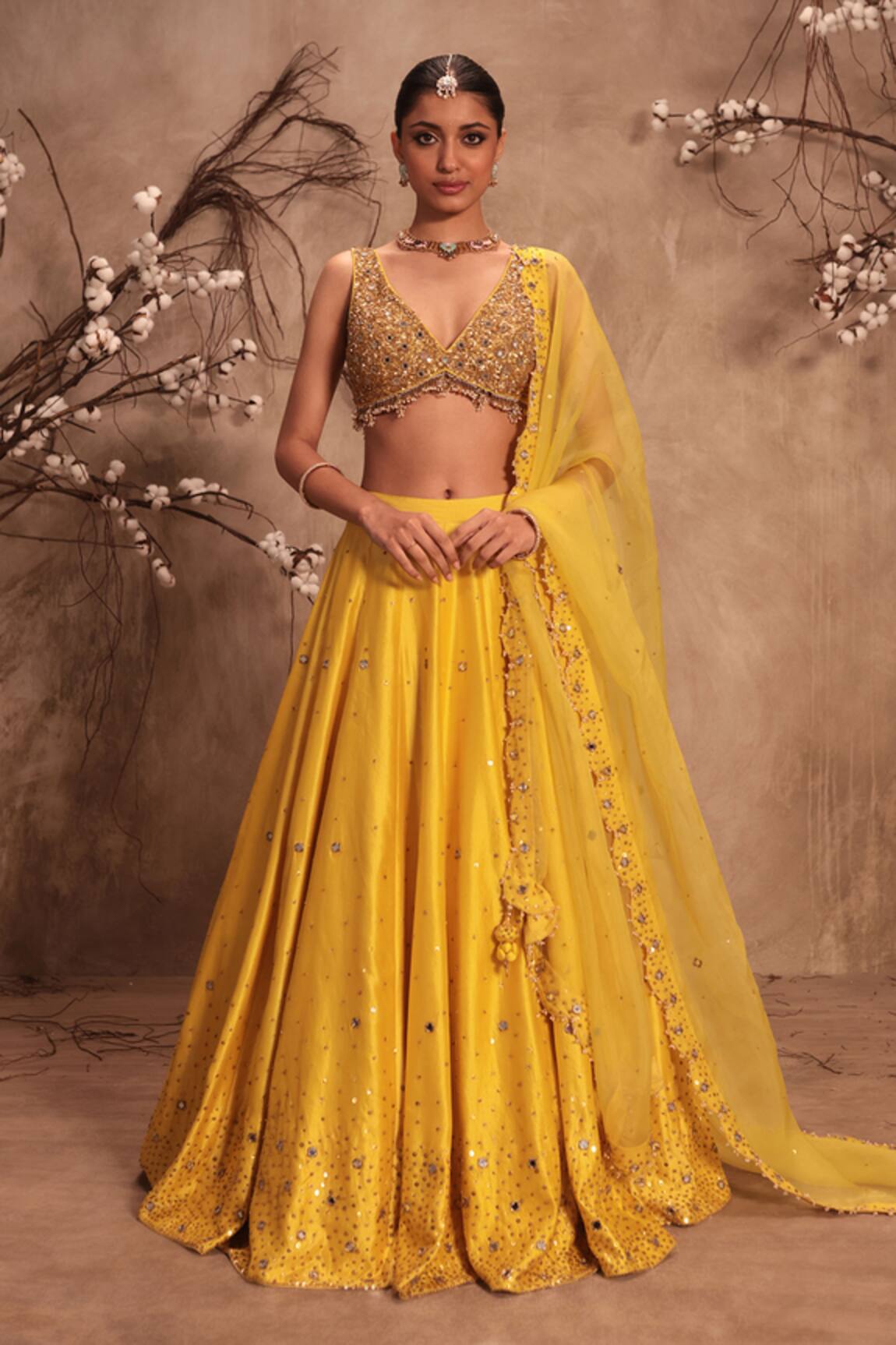 Label Niti Bothra Heavy Embroidered Yellow Lehenga Set 