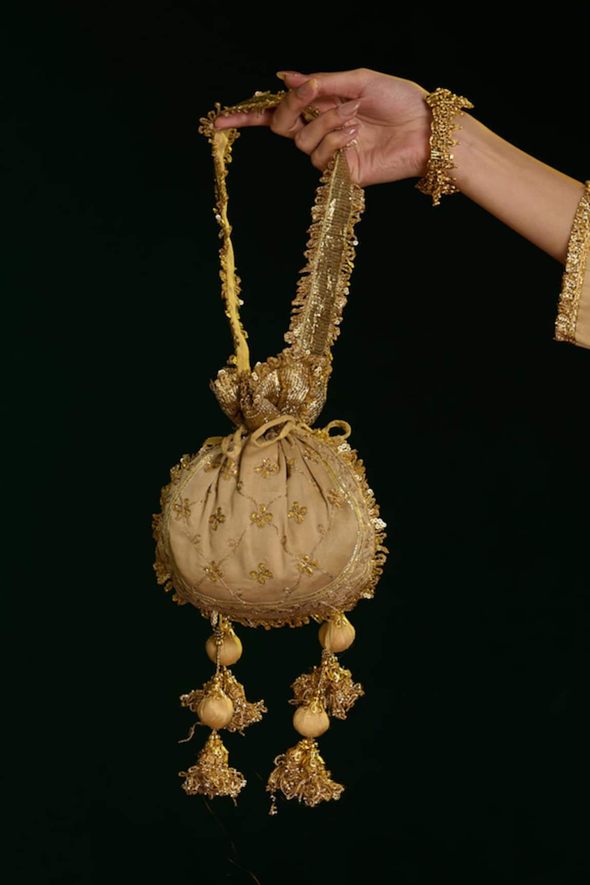 saina kapoor Aari Work Potli Bag 