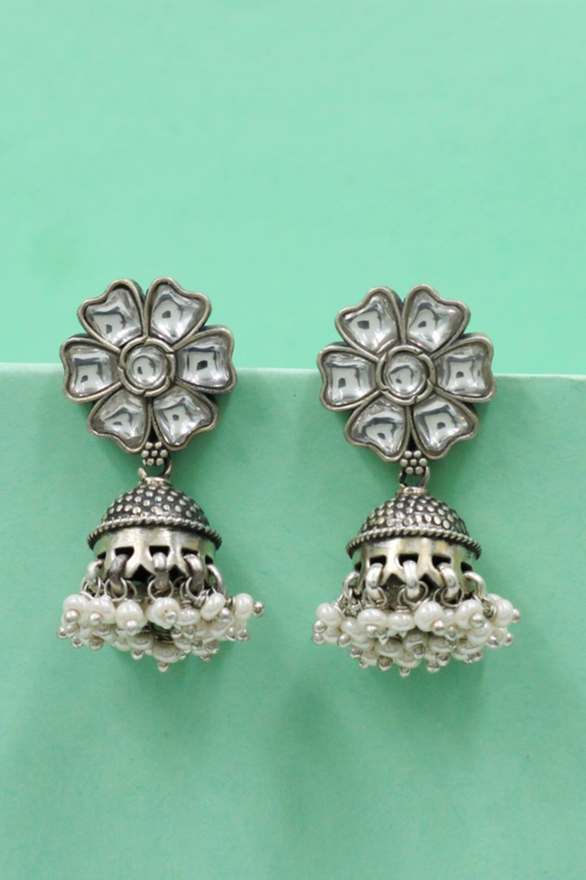 Sangeeta Boochra Handcrafted Floral Silver Jhumka Earrings 