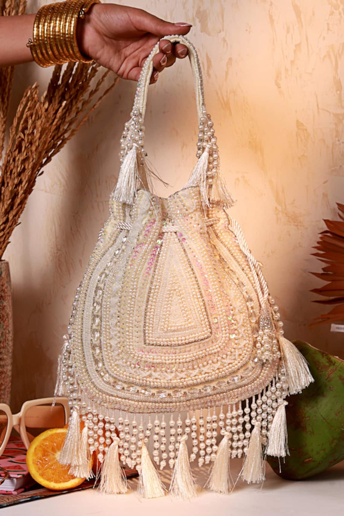 The Tan Clan Nora White Tasselled Potli Bag 