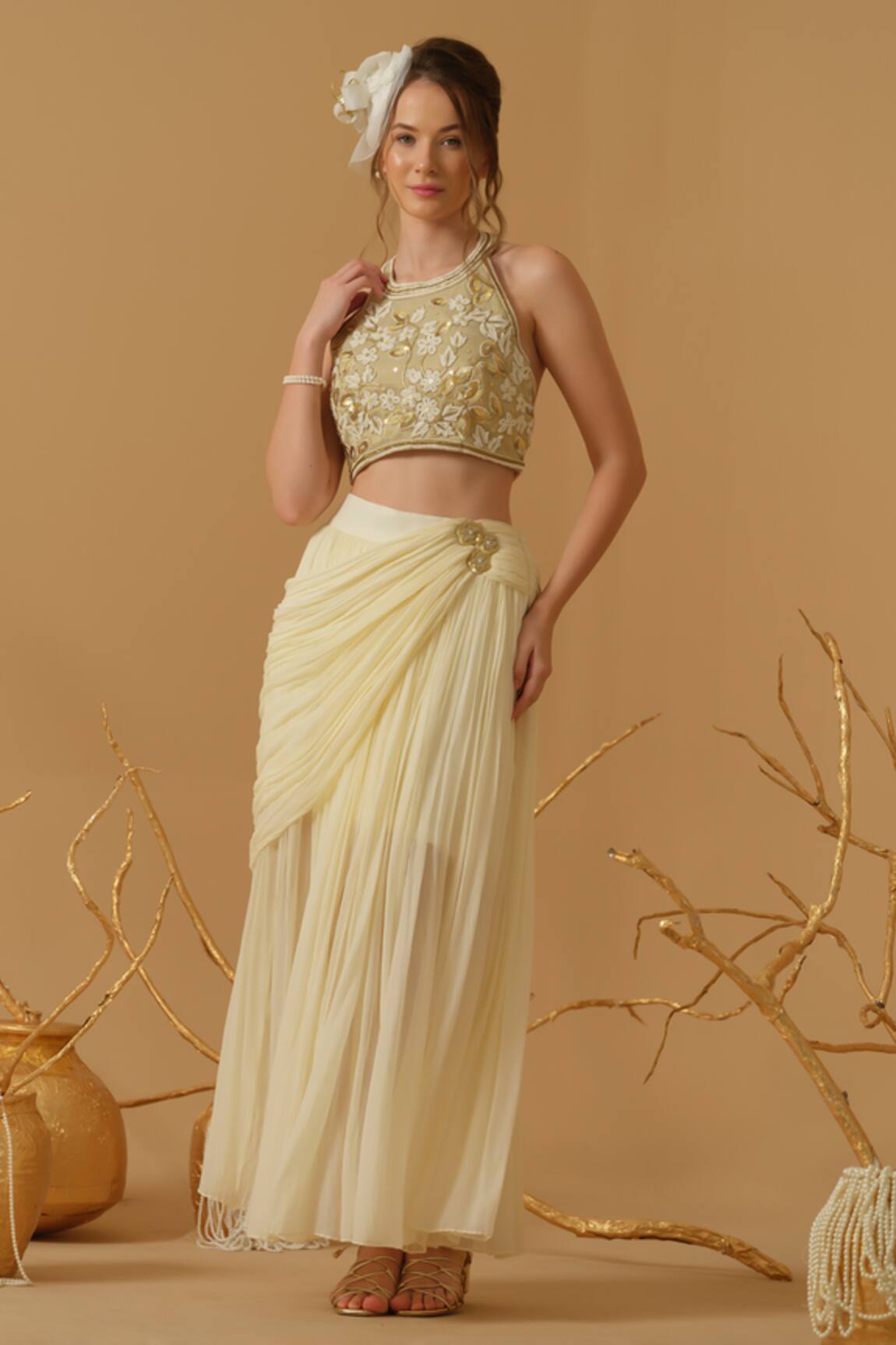 Abstract By Megha Jain Madaan Floral Work Top With Draped Skirt 