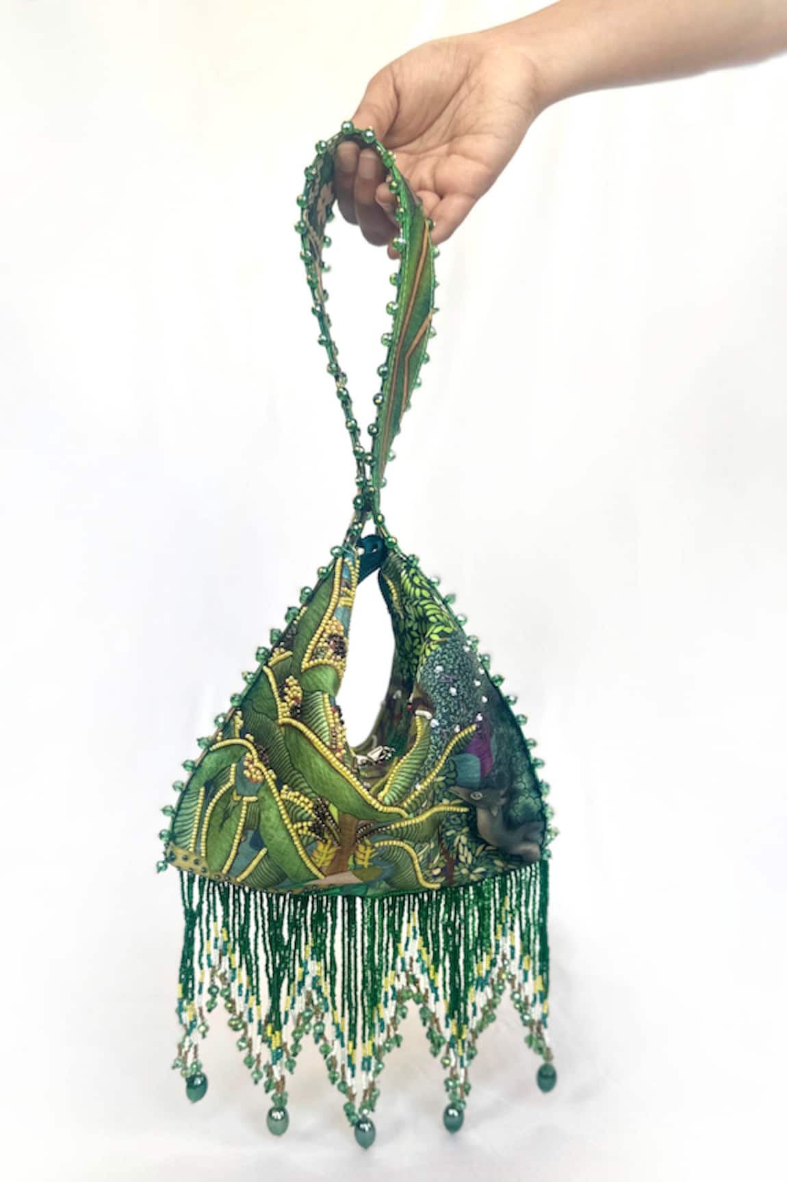 The Garnish Company Vrinda Green Forest Deer Print Fold Potli Bag