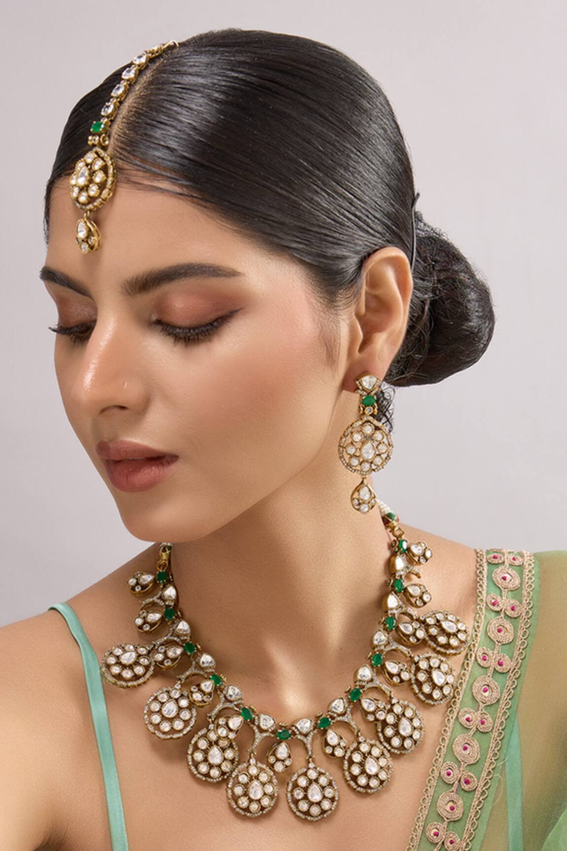 Auraa Trends Kundan Necklace Set with Green Stones & Earrings 