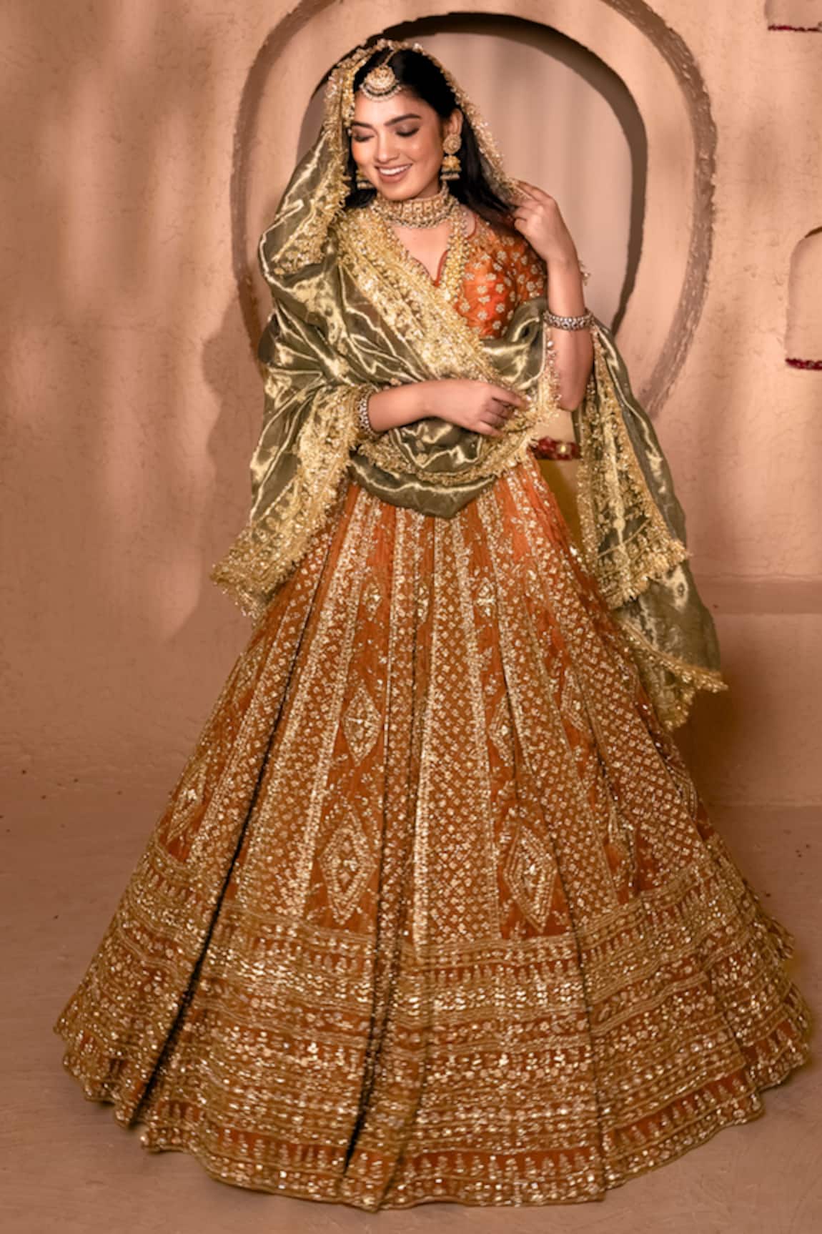 Amaltas Couture Rust Bridal Embroidered Lehenga Set