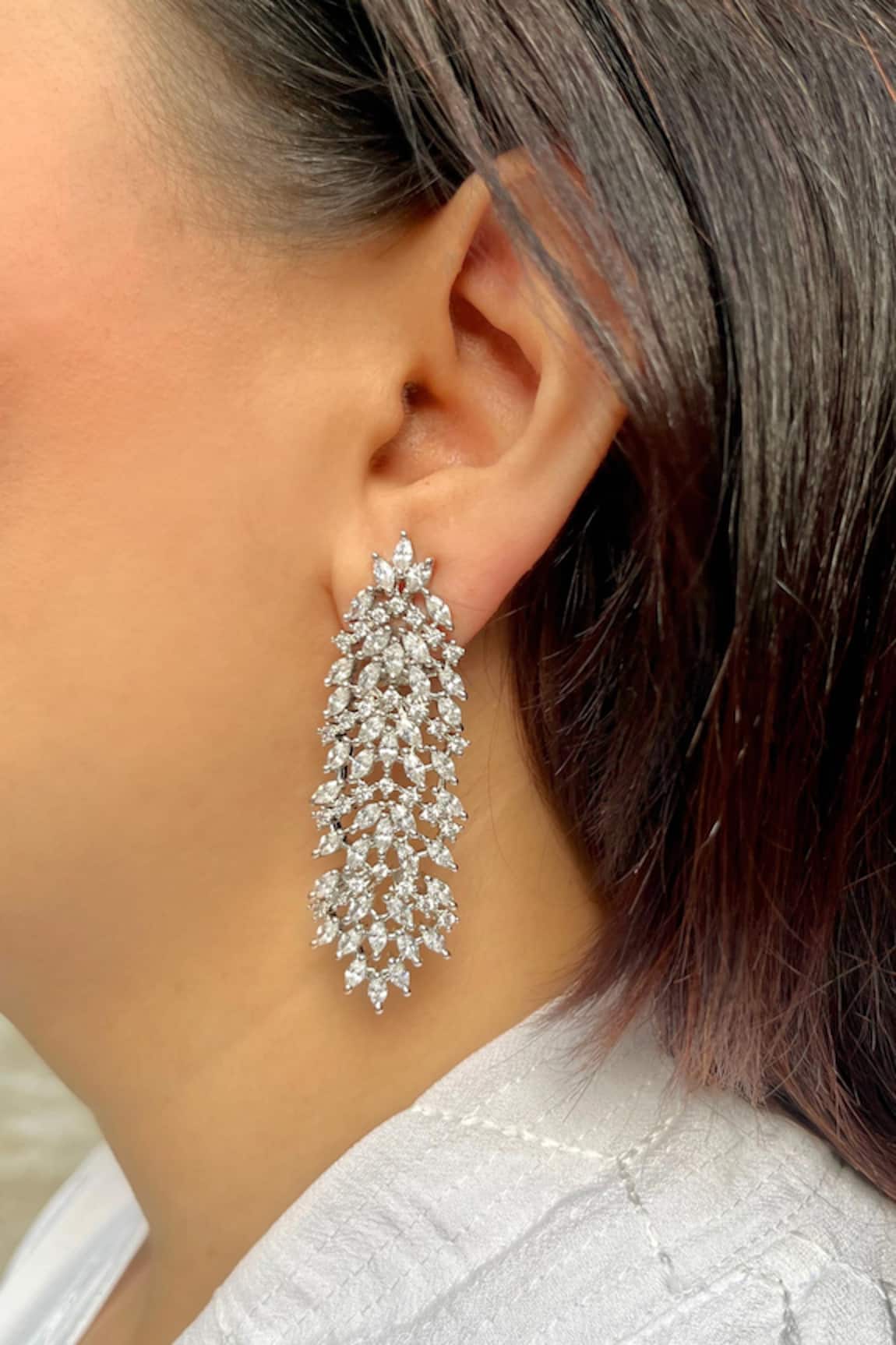 Prestones Sleek Tassel White Zirconia Earrings