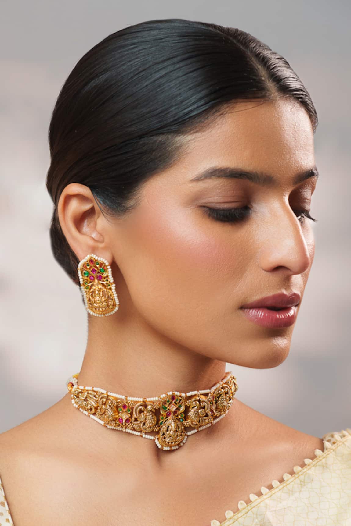 Zevar By Geeta Kundan Embellished Temple Choker Set