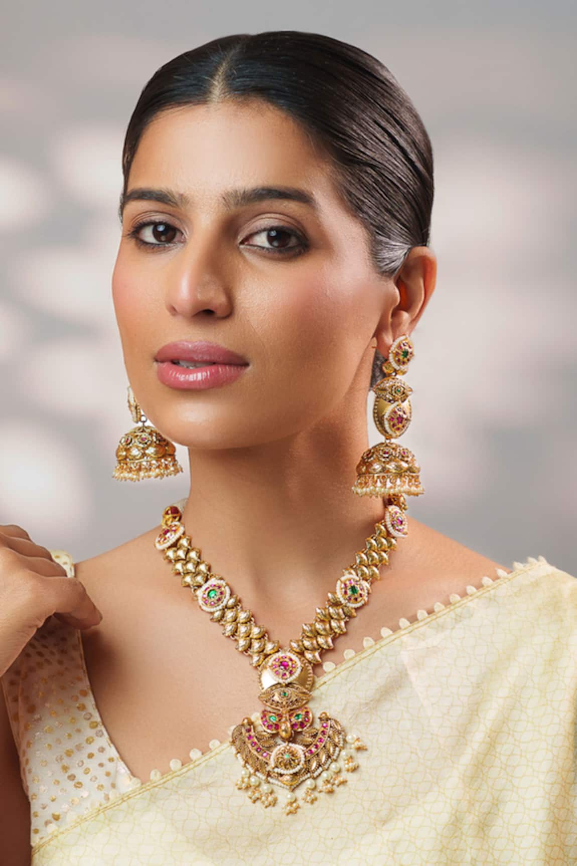 Zevar By Geeta Kundan Embellished Temple Necklace Set