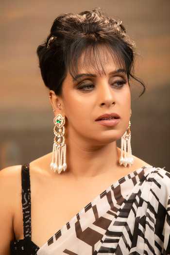 Xago Handcrafted Kundan & Pearl Tassel Earrings 
