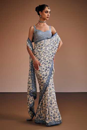The Royaleum Silk Printed Saree With Striped Blouse 