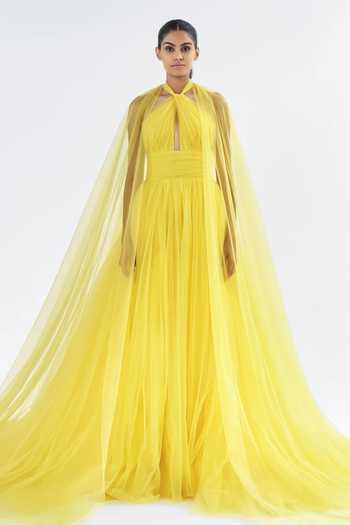 Gauri & Nainika Yellow Halter Neck Gown With Cape Sleeves 