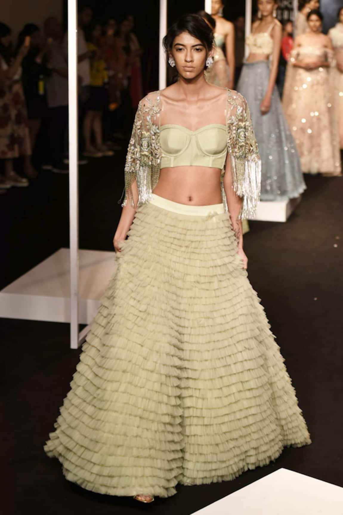 Monika Nidhii Sage green lehenga set with cape