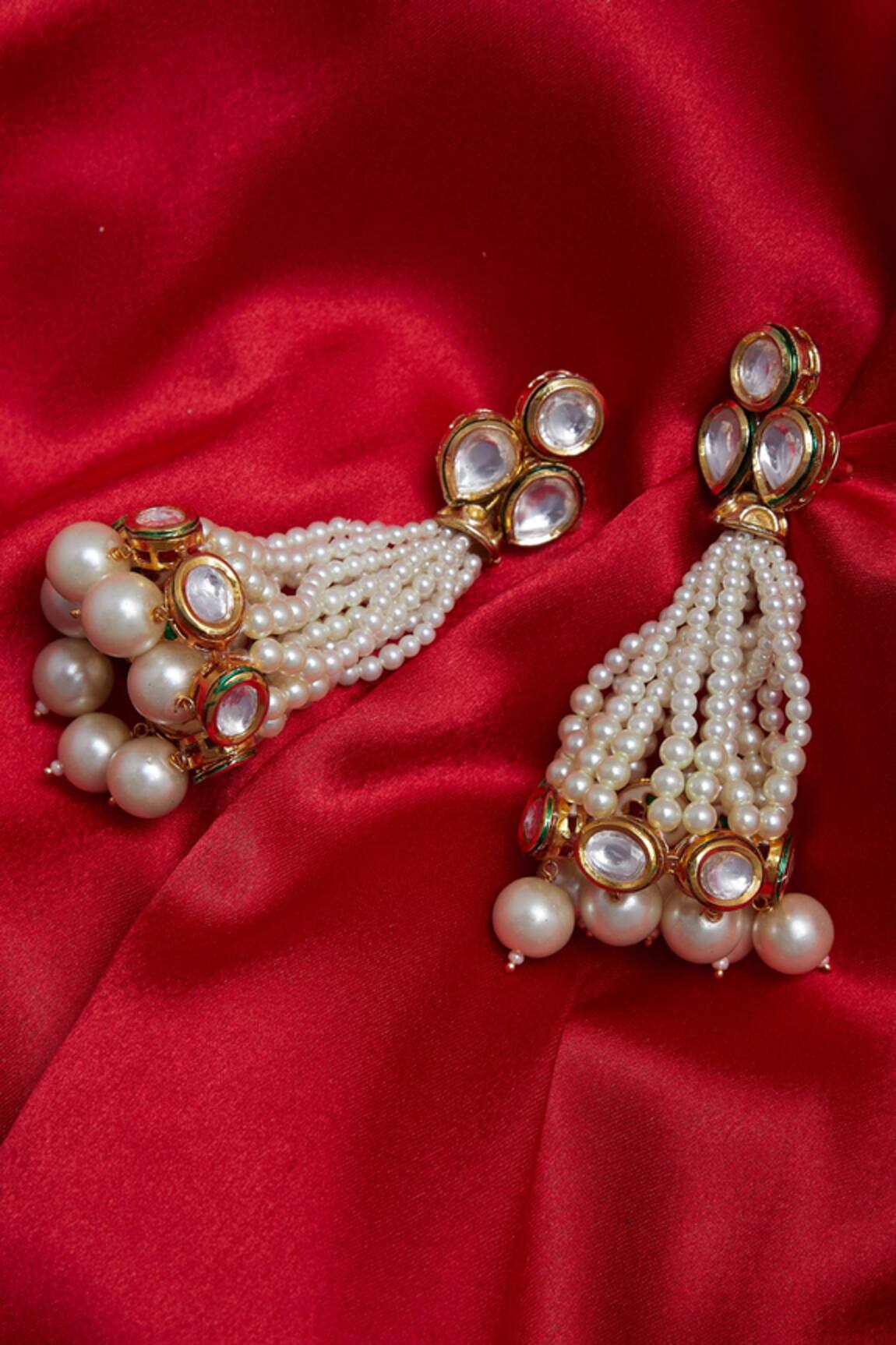 Gewels by Mona Pearl and kundan dangler earrings