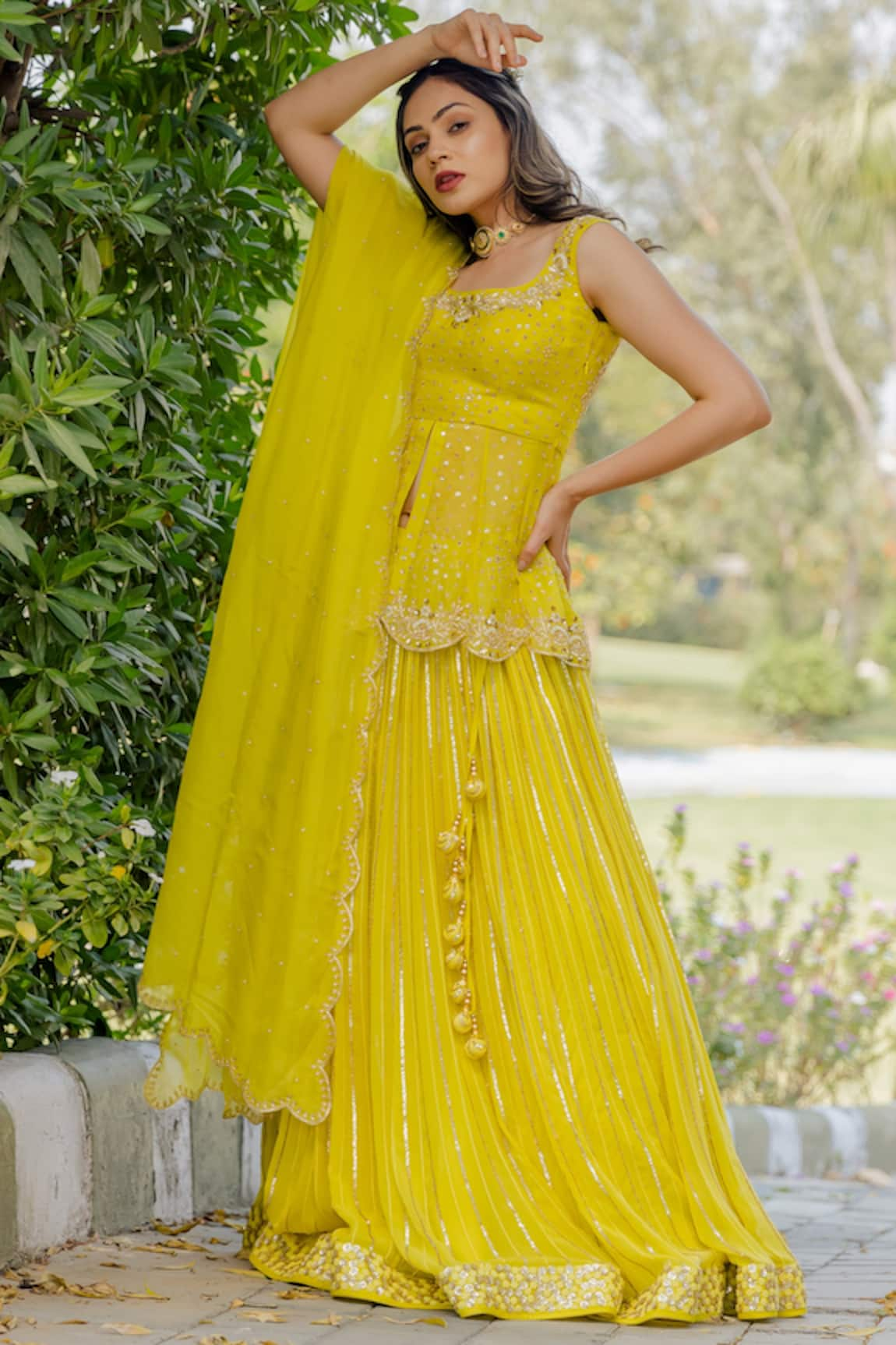 Anupraas by Nishant and Rahul Embroidered Peplum Top & Lehenga Set