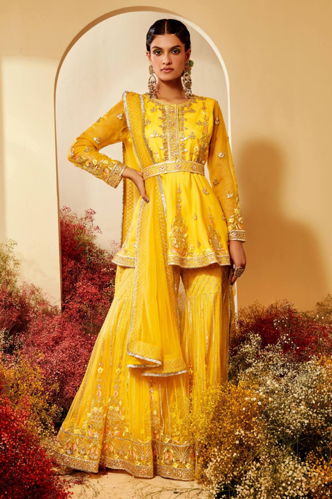 Priyaa Net Embroidered Peplum Kurta Sharara Set