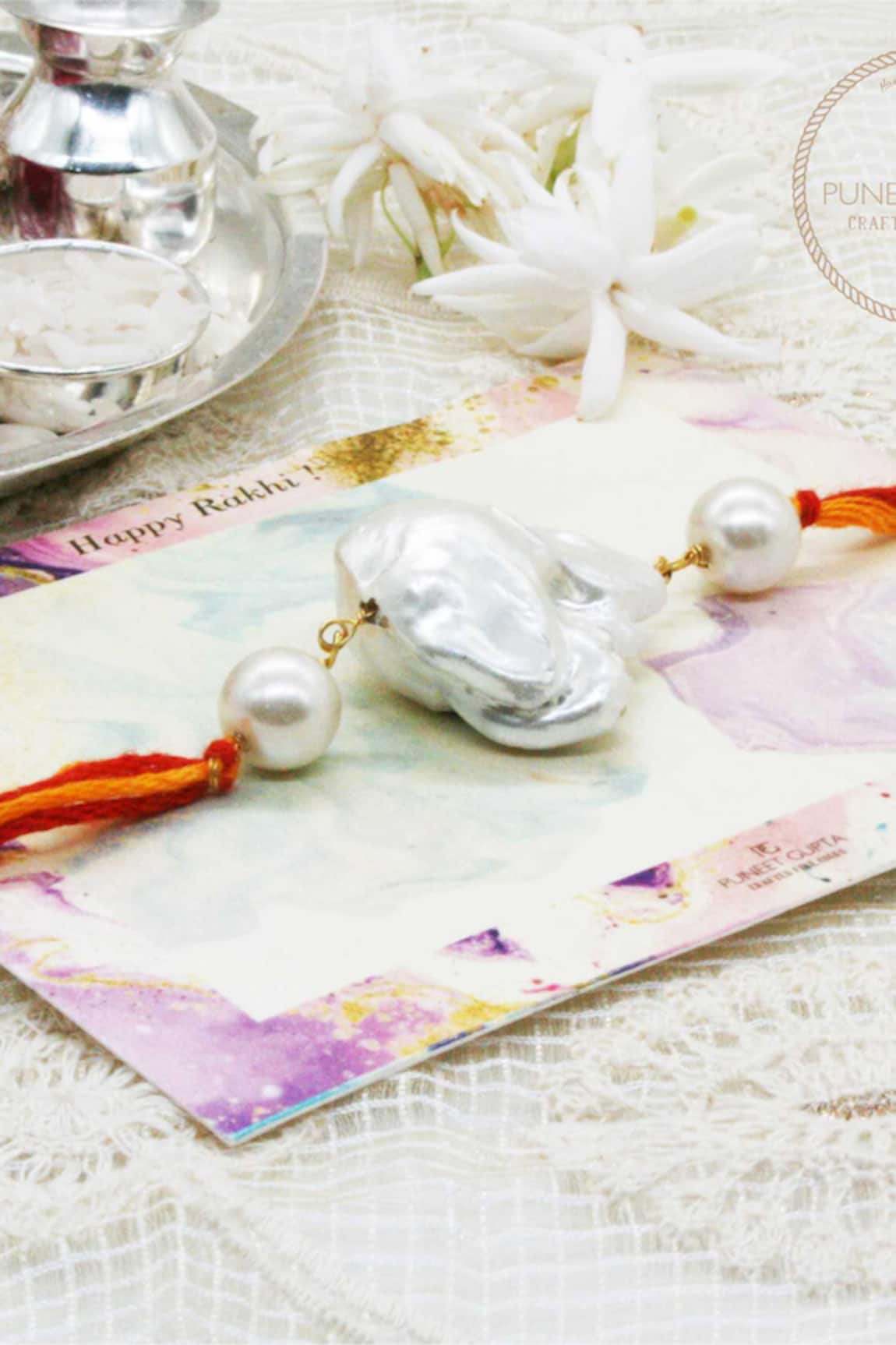 Puneet Gupta Gold Pearl Embellished Rakhi 