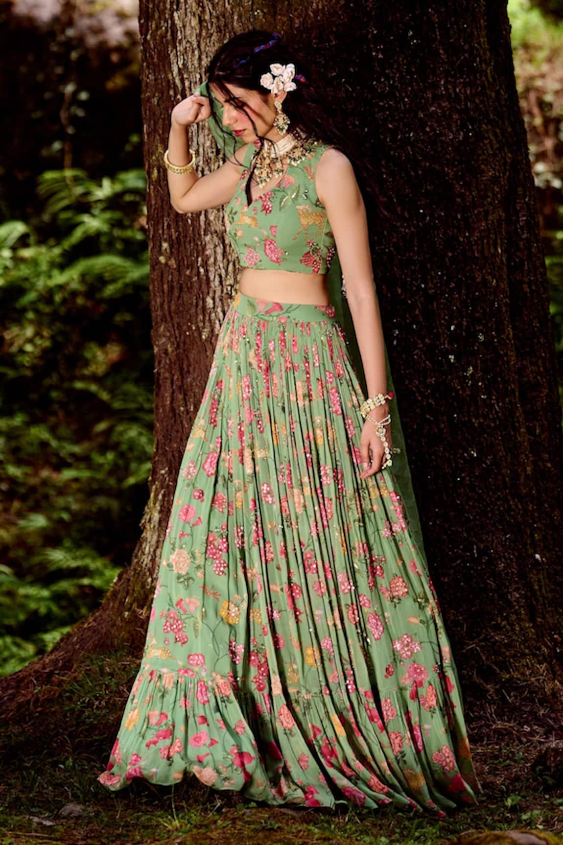 Photo of Off shoulder forest green lehenga for the sister of the bride or  groom