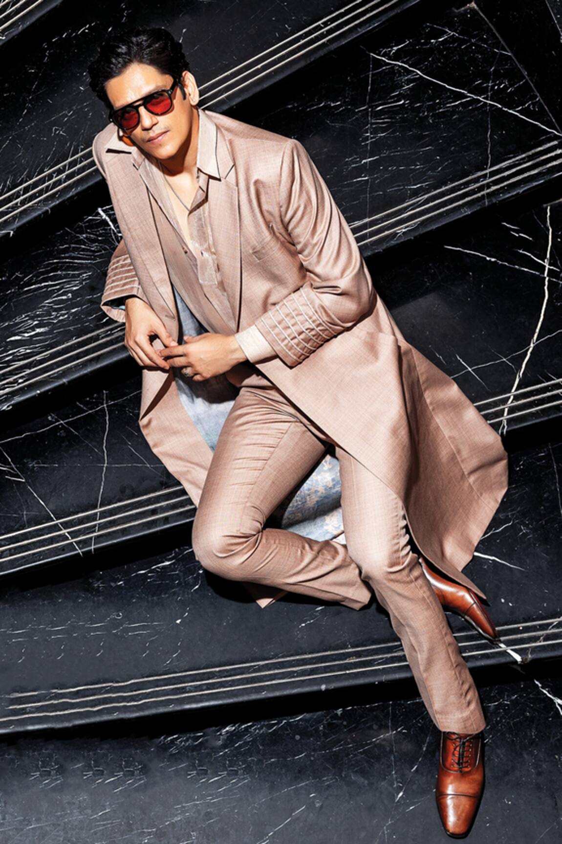 Nirmooha Notch Collar Trench Coat With Belt