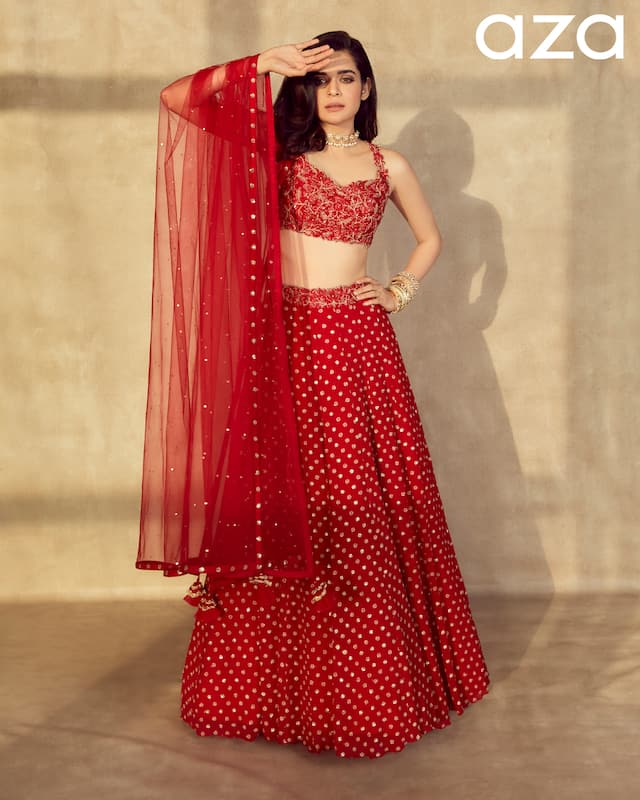 Mithila_Palkar_in_Bridal_Red_lehenga_with_embroidered_motifs_cutwork_waistband