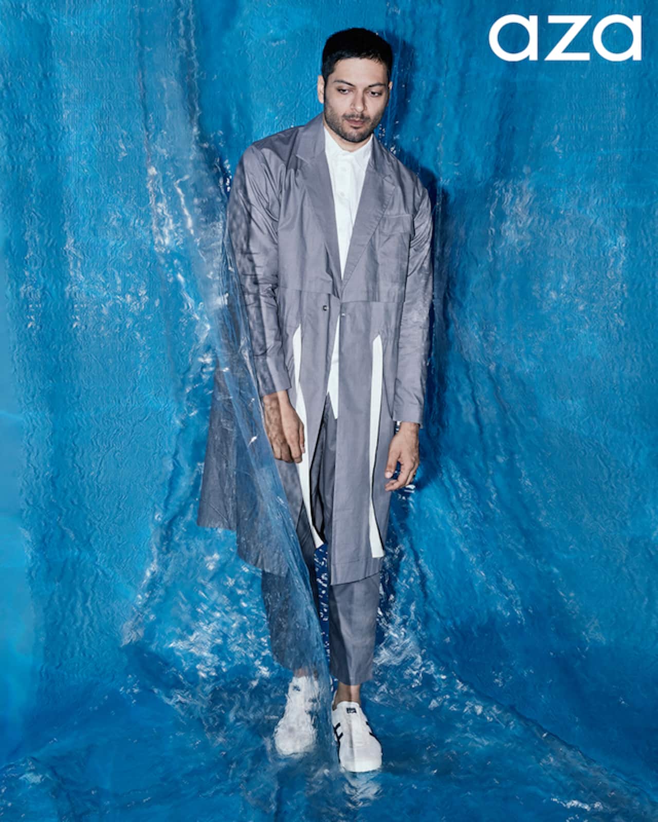 Ali_Fazal_in_Granite_double_layered_jacket_in_poplin_base_with_an_inch_wide_twill_tape_drawstring_flap_pocket_with_front_pleated_pant