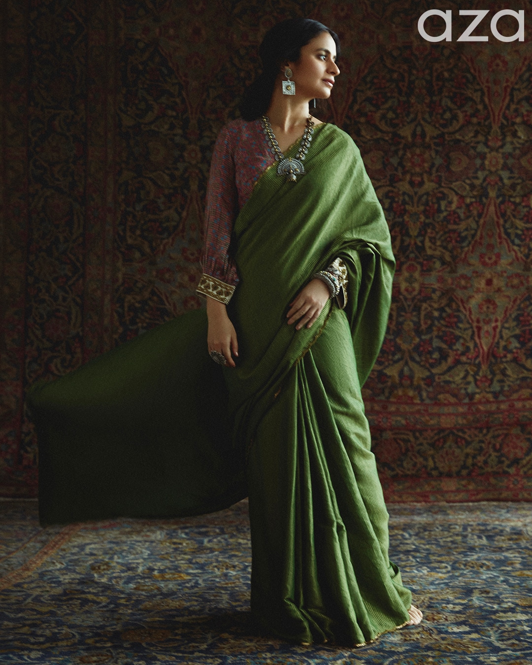 Rasika_Dugal_in_Emerald_green_saree_with_contrast_woven_stripes_and_zardozi_embroidered_border_Paired_with_printed_magenta_unstitched_blouse_fabric