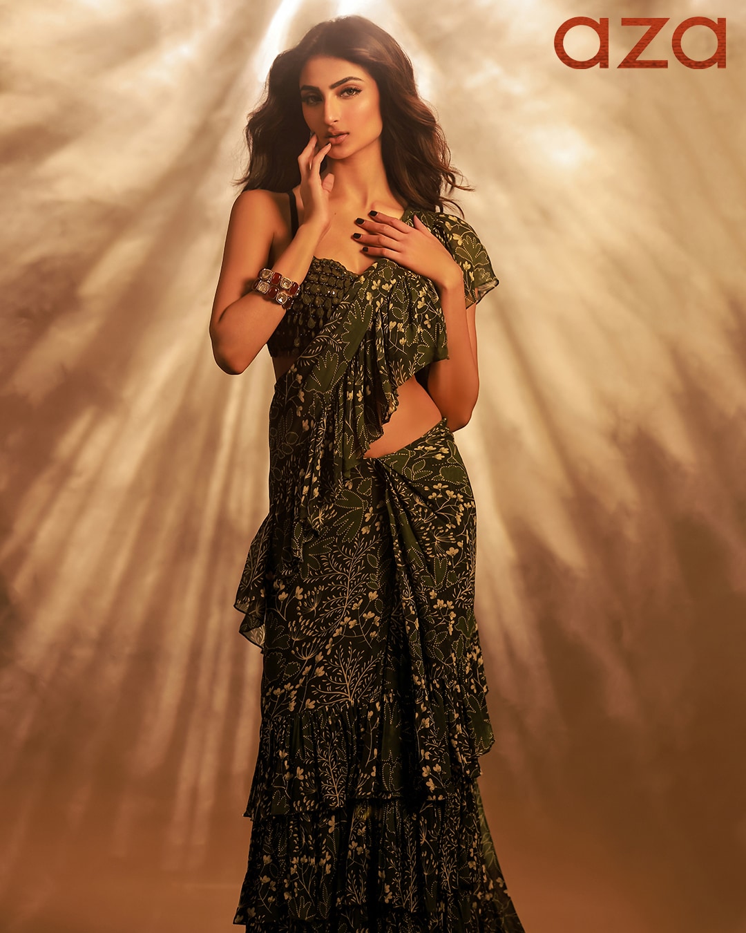 Palak_Tiwari_in_Green_pre-stitched_saree_with_all-over_garden_print_and_ruffle_trim_at_the_border
