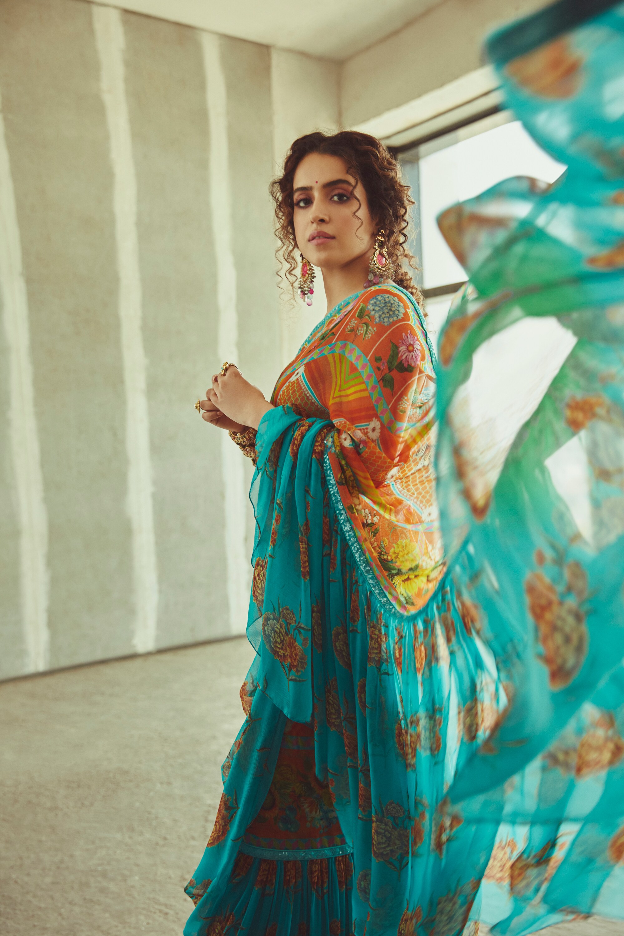 Sanya_Malhotra_in_Torani_Printed_Orange_and_Blue_Saree