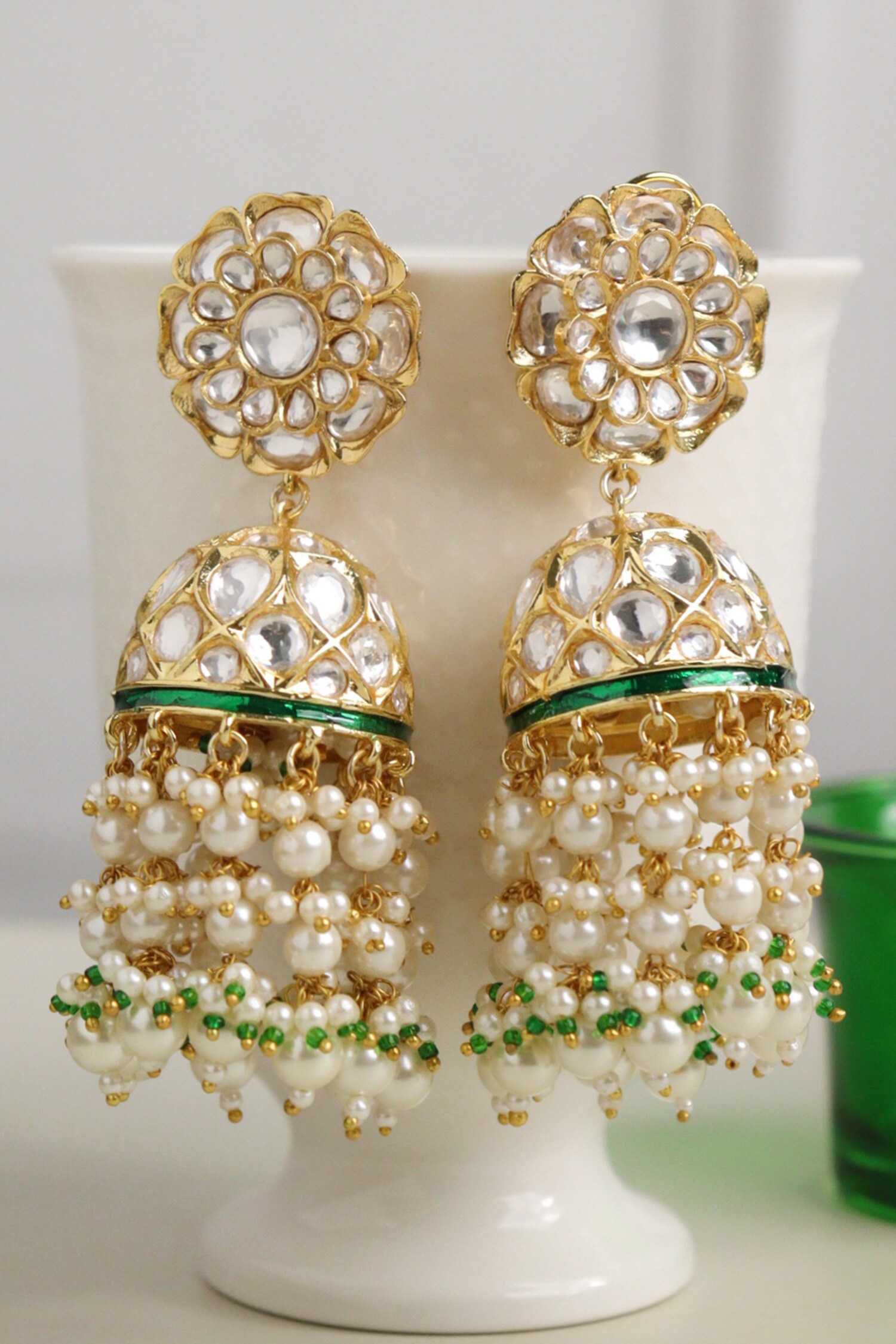 Curio Cottage Kundan And Floral Embellished Jhumka Earrings